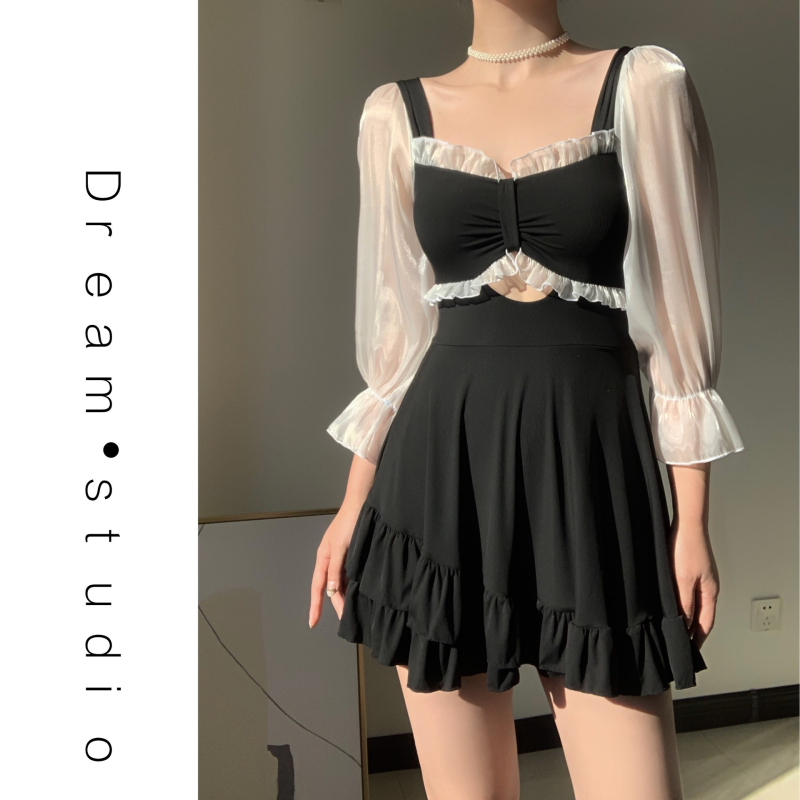 Ženski jednodijelni kupaći kostim s dugim rukavima, suknasti dizajn, jastučići za prsa, bez metalne potpore