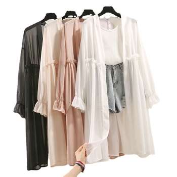 Šifonsko žensko sako-bluza s nepravilnim krojem, srednja duljina 65–80 cm, tanak materijal, balon rukavi, 90–95% poliester