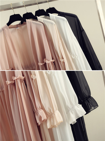 Šifonsko žensko sako-bluza s nepravilnim krojem, srednja duljina 65–80 cm, tanak materijal, balon rukavi, 90–95% poliester