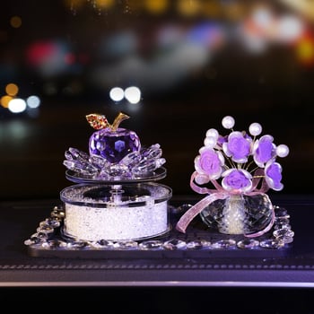 Αυτοκινητική διακόσμηση με ηλιακή τροφοδοσία: περιστρεφόμενο κρύσταλλο μήλο και δοχείο αρώματος σε σχέδιο λωτού για κεντρική κονσόλα