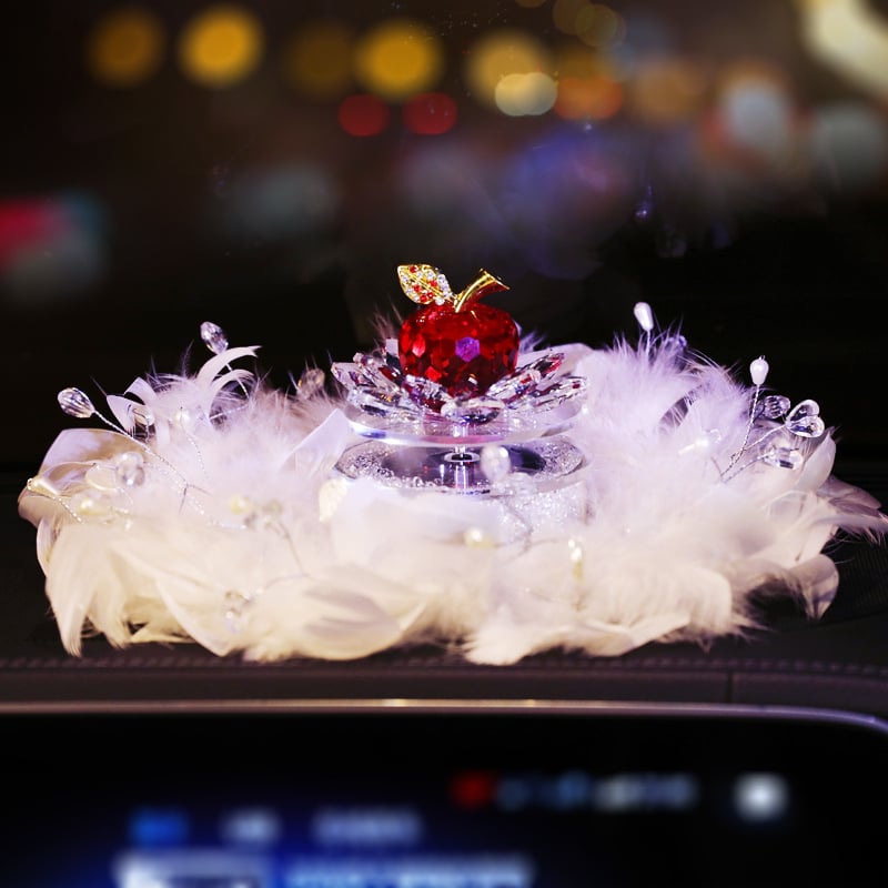 Αυτοκινητική διακόσμηση με ηλιακή τροφοδοσία: περιστρεφόμενο κρύσταλλο μήλο και δοχείο αρώματος σε σχέδιο λωτού για κεντρική κονσόλα