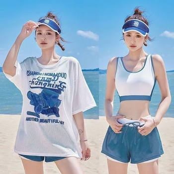 Ženski konzervativni kupaći kostim s tri dijela: odvojeni gornji dio uz labavi vanjski top, cvjetni uzorak, jastučić za prsa, tkanina poliester/nailon