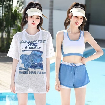 Ženski konzervativni kupaći kostim s tri dijela: odvojeni gornji dio uz labavi vanjski top, cvjetni uzorak, jastučić za prsa, tkanina poliester/nailon