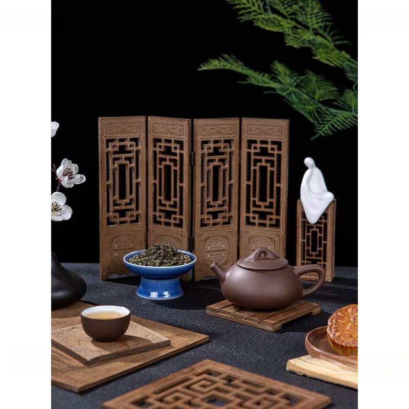 Vintage stílusú mini összecsukható képernyő fotórekvizit, kézzel készített sütemények és tealevelek hátterével