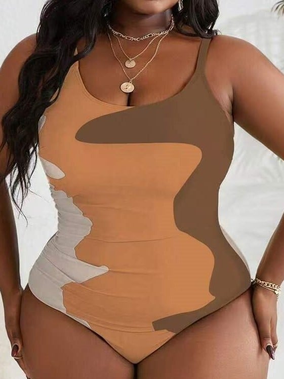 Jednodijelni kupaći kostim s printsom, otvorena leđa, visoka elastičnost i jastučić za prsa.