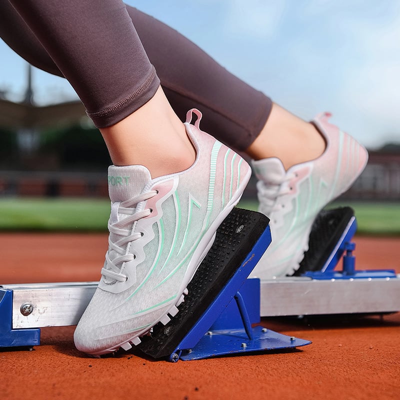 7-tüskés pályaszprint cipő, légáteresztő hálós felsőrész, könnyű, alacsony profilú, természetes gumi talp