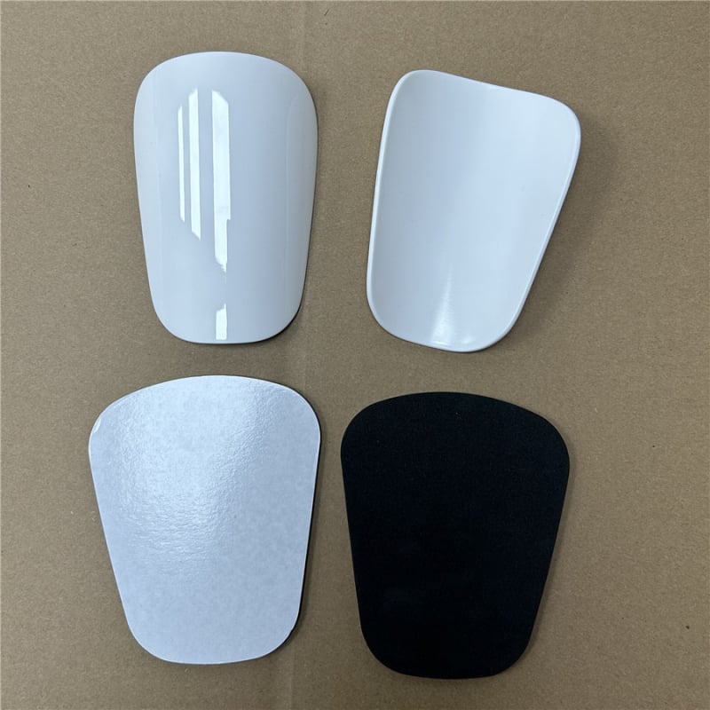 Futball sípcsontvédők közvetlen csatlakozási dizájnnal (anyag: műanyag; testreszabás: igen; alkalmazás: futball; licencelhető magánmárkák: igen)