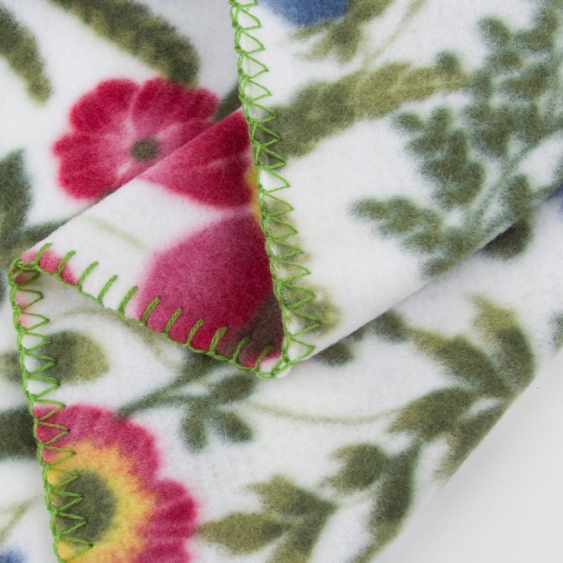 Διπλής όψεως φλις κουβέρτα με άκρη overlock σε σχήμα U, τρίγωνικό ράψιμο, 180 g, πολυεστέρας, μοτίβο φυτών και λουλουδιών