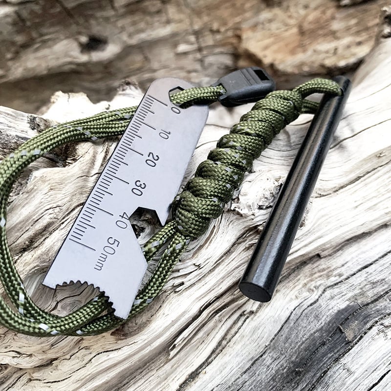 Пръчка за запалване на огън с магнезиева пръчка и скребач, обвита в седемнишен паракорд; тежести 43 g, 68 g, 129 g; за един или повече потребители; Creator