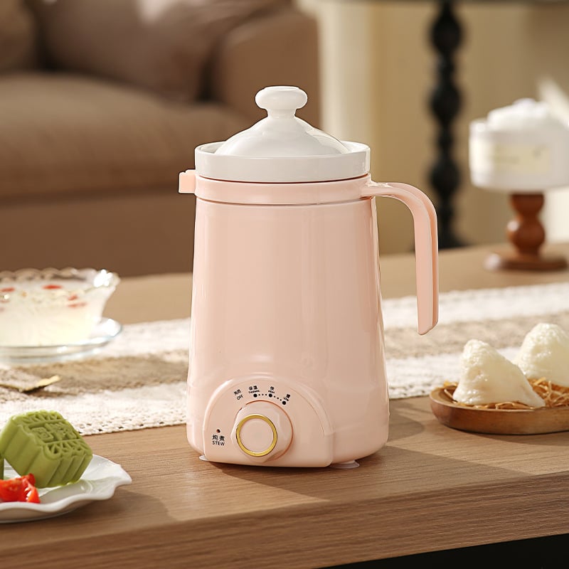 Ceașcă electrică de încălzire cu plită încorporată, brand Emperor Meal, putere sub 1000 W, capacitate sub 1 L, cablu de alimentare 0,7 m, potrivită pentru 1–2 persoane