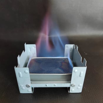 Преносима алкохолна печка за 1–2 души, ултралека, ветроустойчива, с поддържане на топлина; материал: неръждаема стомана; тегло 22 g