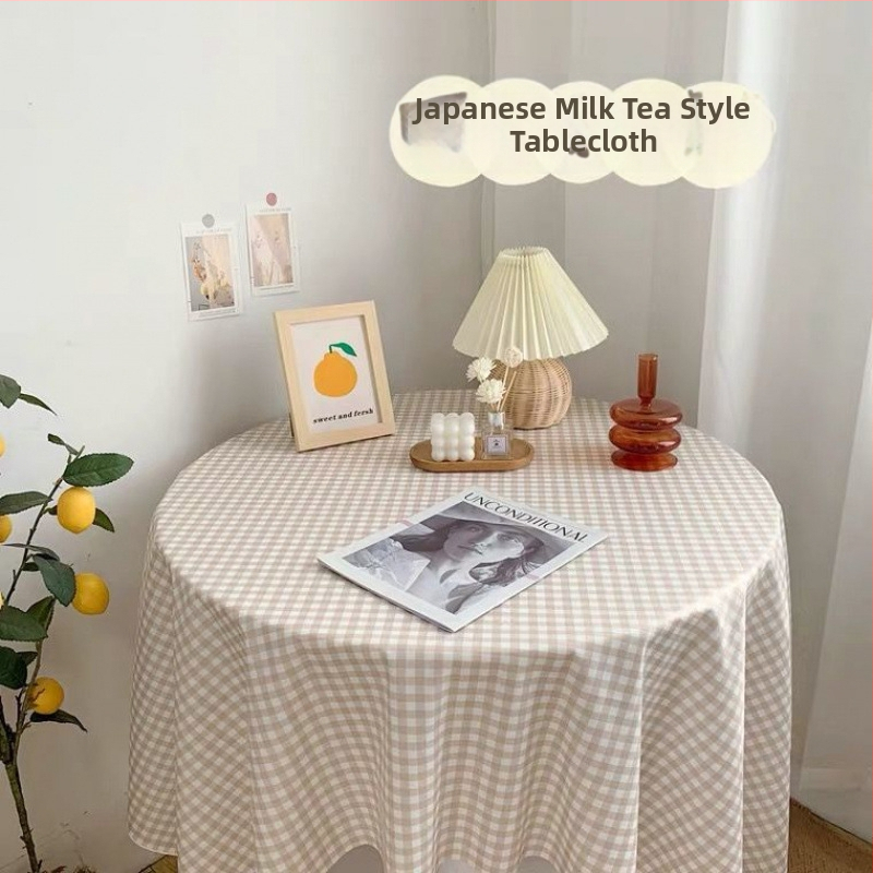 Stolnjak kremasto žute boje s cvjetnim uzorkom, piknik inspiriran ruralnim stilom