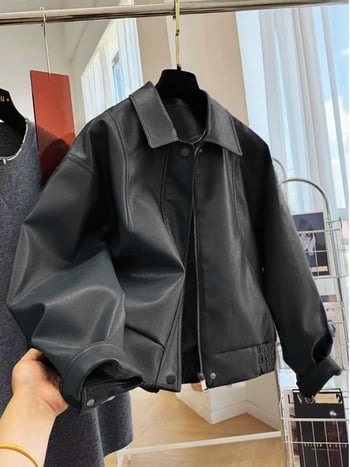 Női bőrdzseki reveres nyakkal, cipzáros záródás, dolman ujjú, lazább szabás, PU anyag, téli 2025