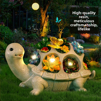 Gyanta kerti szobor: teknősbéka és pillangó, napelemes fénydísz a kerthez
