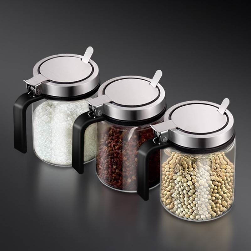 Staklena posuda za začine s opružnim poklopcem od nehrđajućeg čelika, vlagootporna, s držačem i malom žličicom, za čvrste začine