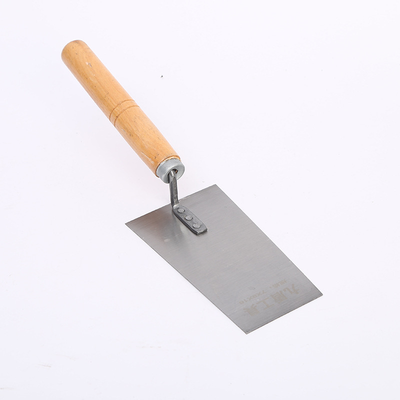 Zidarski alat: lopata za pločice, špatula, nož za malter, nož za gletanje; ugljično čelični materijal; marka Nine Guilders; model Spoon; dekorativni radovi.