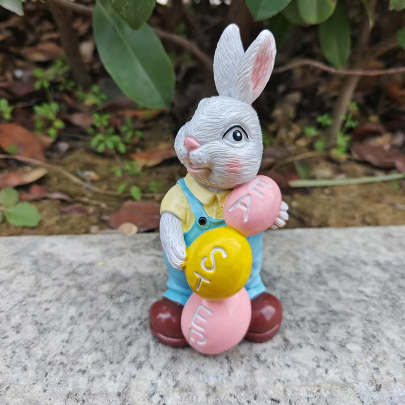 Húsvéti nyúl szobor, rajzfilmszerű stílus, szintetikus gyanta, karton csomagolás, Xingmao márka