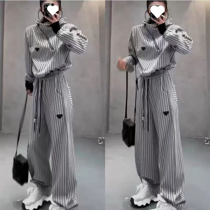 Ženski dvodijelni set: prugasti hoodie s kapuljom i dugu hlaće – opušten kroj, poliester 90–95% s otiskom i bojom