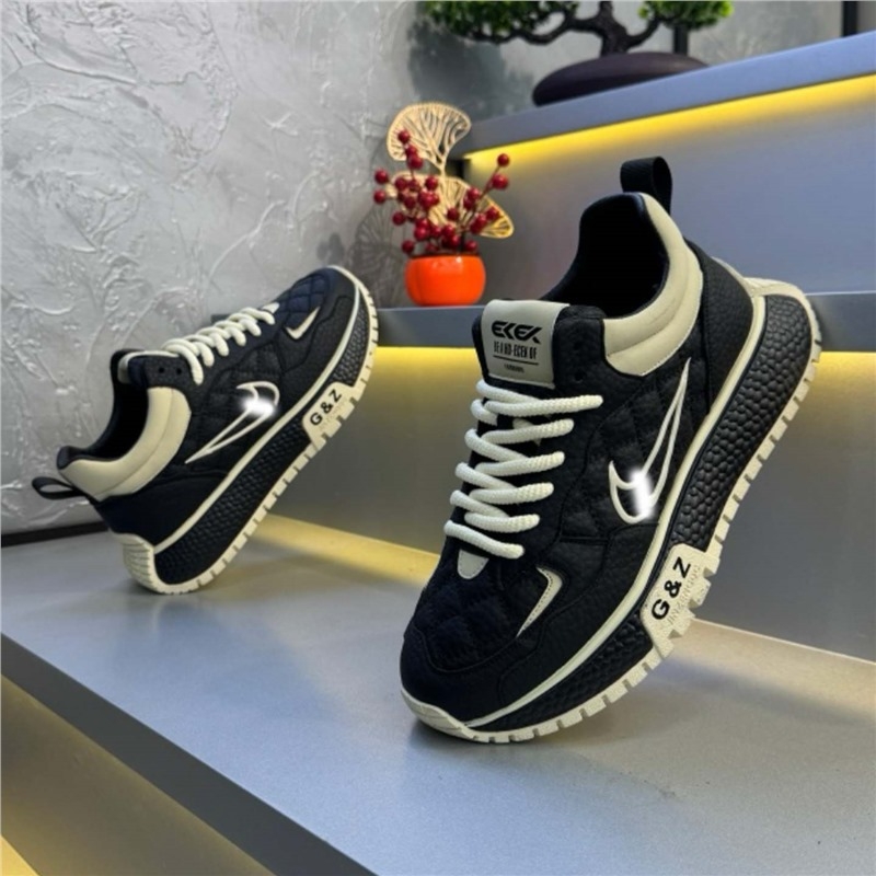 Férfiaknak készült vastag talpú sportcipő, lélegző bélésű bőrrel, felső része marhabőrből készült velúr, alacsony szárú