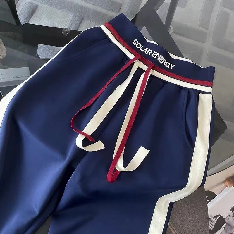 Ženski casual sportski dvodijelni set: kardigan i hlače s širokim krojem, prugasti/karirani uzorak, poliester, sadržaj poliester 30–50%, jesen 2025