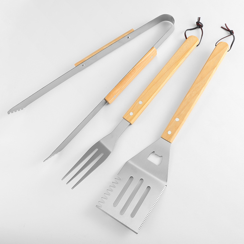 Σετ εργαλείων μπάρμπεκιου από ανοξείδωτο ατσάλι με ξύλινο χερούλι, περιλαμβάνει κλιπ, πιρούνι και φτυάρι; κατασκευή από αλουμίνιο; ασύμμετο σχέδιο; συσκευασία 12 τεμαχίων.