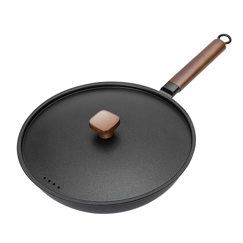 Wok od pročišćenog željeza, otporan na hrđu, kompatibilan sa svim vrstama štednjaka, dubina 9,4 cm, težina 2,3 kg