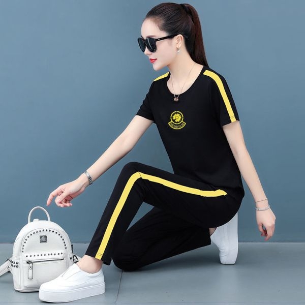 Női két darabból álló ruhaszett: hosszú ujjú felső és hosszú nadrág, poliészter 95% feletti, panelvarrás, elegáns üzleti stílus