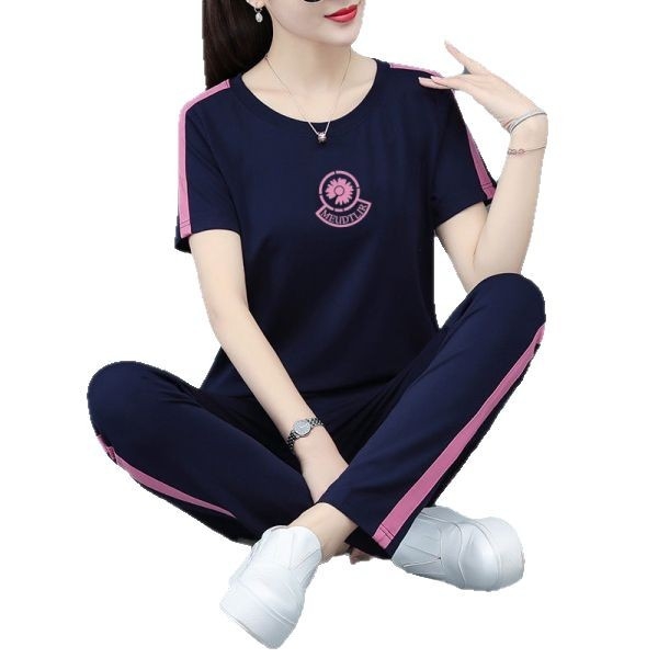 Női két darabból álló ruhaszett: hosszú ujjú felső és hosszú nadrág, poliészter 95% feletti, panelvarrás, elegáns üzleti stílus