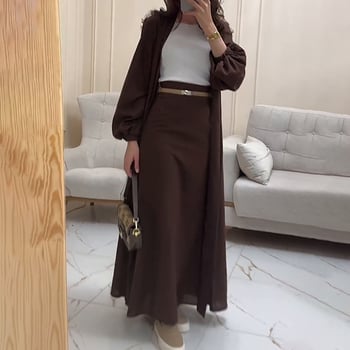 Set din două piese: top cu decolteu în V, mâneci lungi și fustă lungă din poliester, primăvara 2025