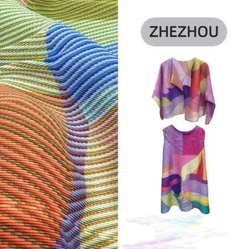 Pleat World Geometriai mintás két részes szoknyás kosztüm, midi hosszú szoknya, poliészter anyag, 95% feletti poliészter-tartalom, elegáns irodai stílus