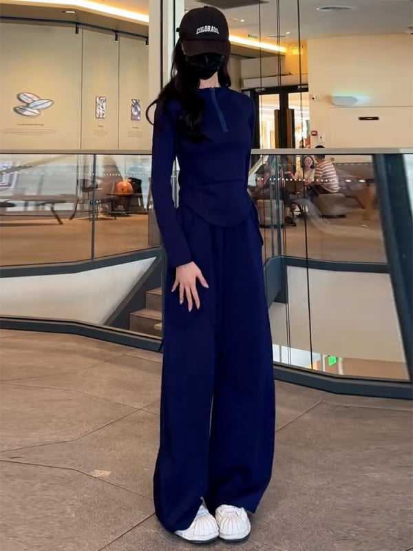 Női téli kétszemélyes sportos szett – pulóver félcipzárral és széles szárú nadrággal, patchwork dizájn, poliészter/elasztán alapanyag, 2024 tél