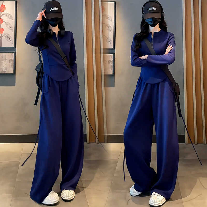 Női téli kétszemélyes sportos szett – pulóver félcipzárral és széles szárú nadrággal, patchwork dizájn, poliészter/elasztán alapanyag, 2024 tél