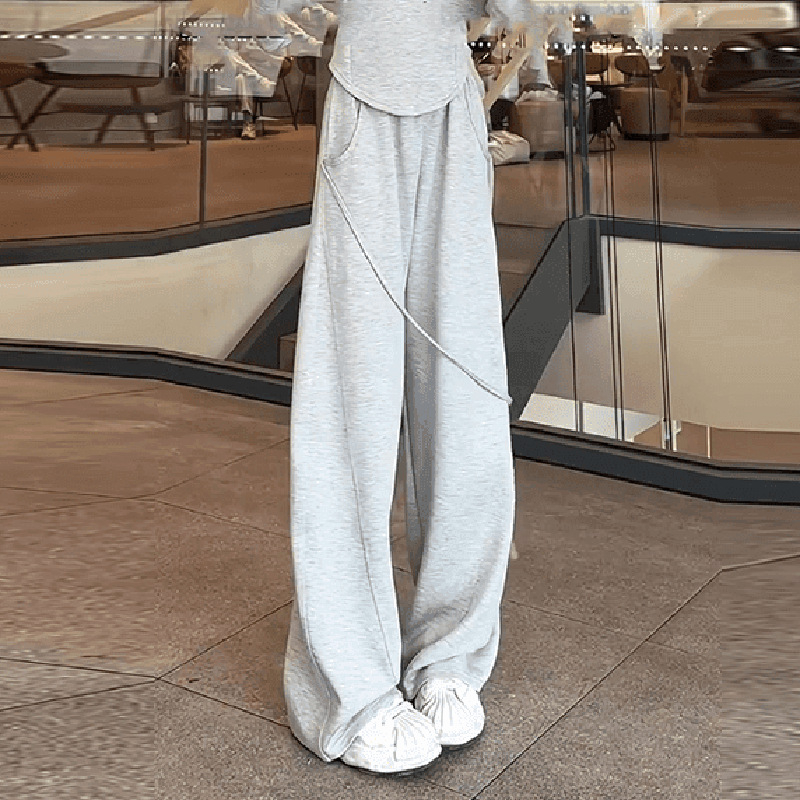 Női téli kétszemélyes sportos szett – pulóver félcipzárral és széles szárú nadrággal, patchwork dizájn, poliészter/elasztán alapanyag, 2024 tél