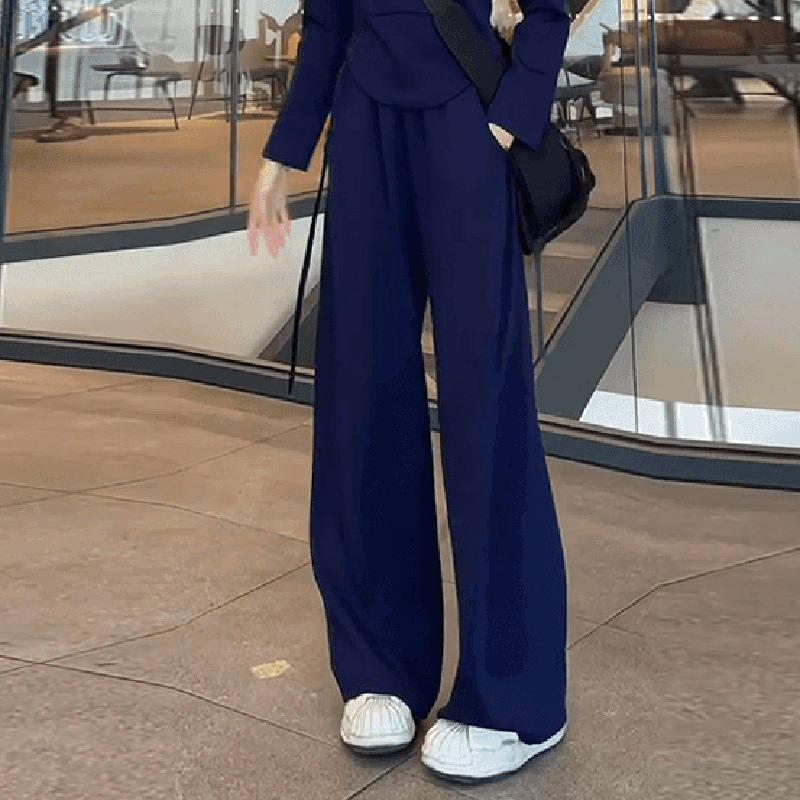 Női téli kétszemélyes sportos szett – pulóver félcipzárral és széles szárú nadrággal, patchwork dizájn, poliészter/elasztán alapanyag, 2024 tél