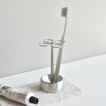 Držač za četkice s UV sterilizacijom — 4 pretinca, nehrđajući čelik, usisno pričvršćivanje, dizajn četiri lista, japanski stil