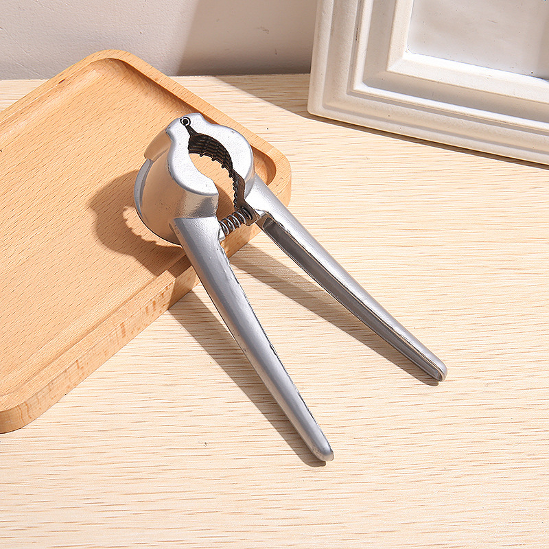 Обновен инструмент за чупене на орехи и обелване на ядки – фунияобразна форма, алуминиева сплав