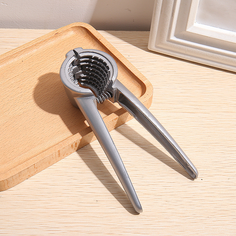 Обновен инструмент за чупене на орехи и обелване на ядки – фунияобразна форма, алуминиева сплав