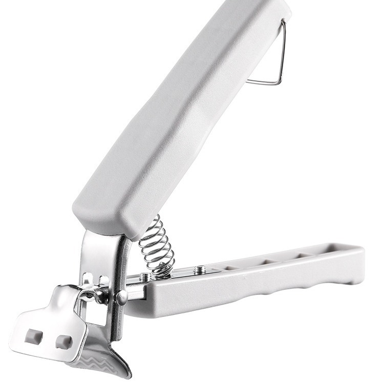 KOMEKI Višestruki klips protiv opeklina za vruće ploče; materijali: plastika, nehrđajući čelik, željezo