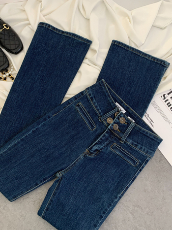 Traperice visokog struka, šire nogavice, denim, 70–80% poliestera, srednja elastičnost