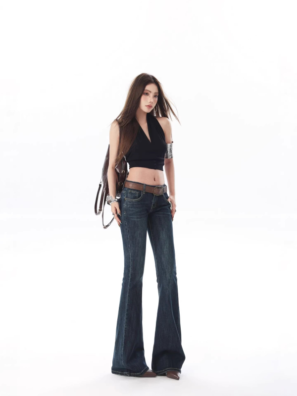 K609 Traperice: niski struk, mikro-bell kroj, elastični denim, slim-fit