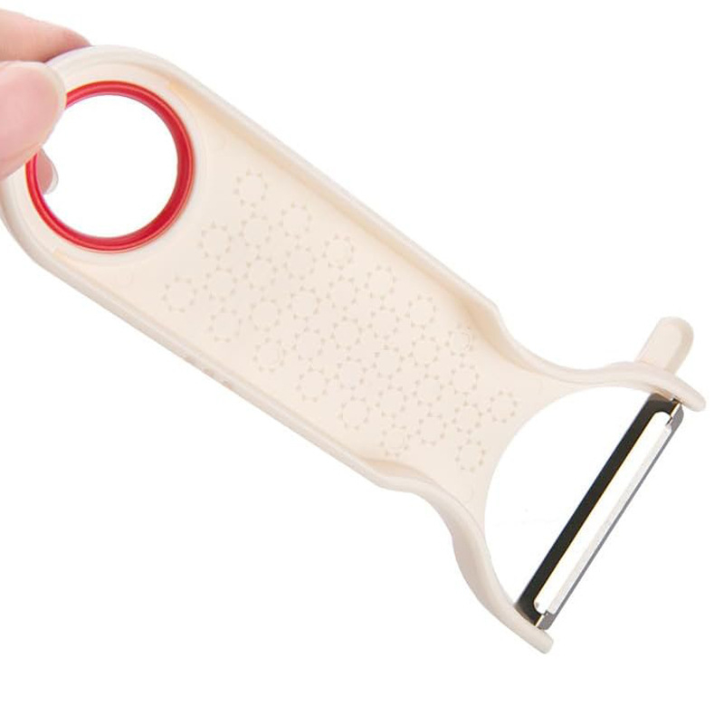 Desfăcător/curățător multifuncțional pentru fructe și legume — lamă din oțel inoxidabil, corp din polistiren, origine Japonia, lansare în 2023