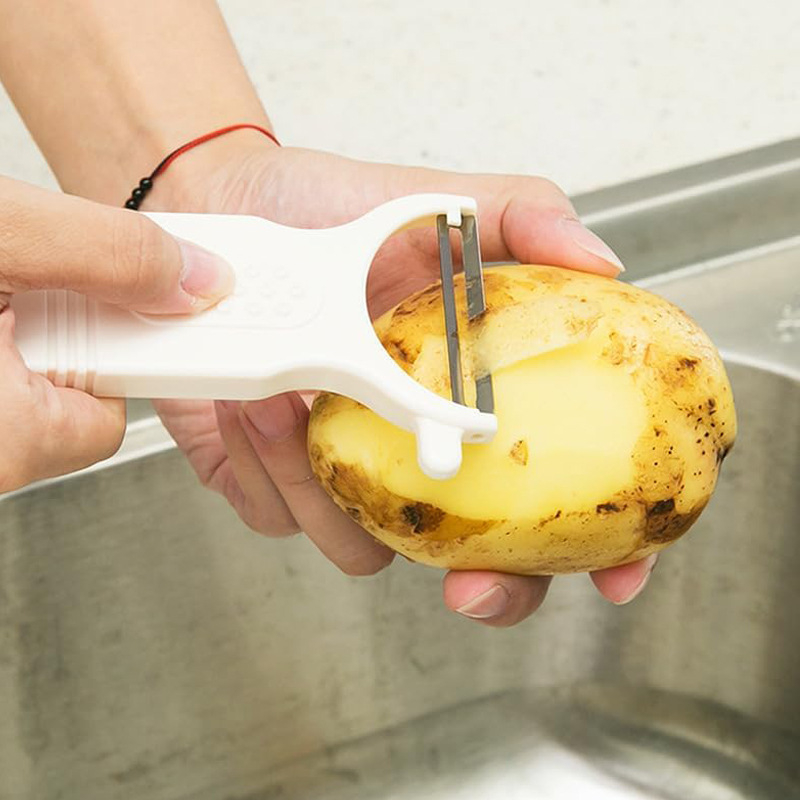 Desfăcător/curățător multifuncțional pentru fructe și legume — lamă din oțel inoxidabil, corp din polistiren, origine Japonia, lansare în 2023
