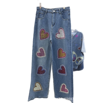 Traperice – srce sa štrasom, toplinski nanesene štras kamene, visokim strukom, širokih nogavica, gradski hipster stil