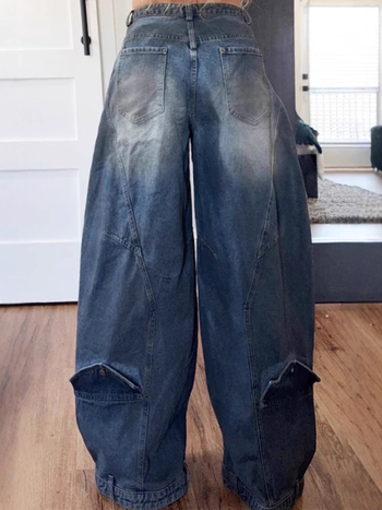 Traperice scimitar-cut, slobodan kroj, srednji struk, denim s 50–70% pamuka, vintage distresirano oprano