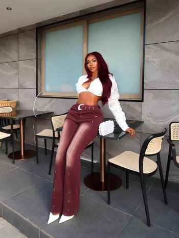 Traperice visokog struka, bootcut kroj, denim s 70–80% denim i Spandex, micro-blown acid-wash, retro eyelet design