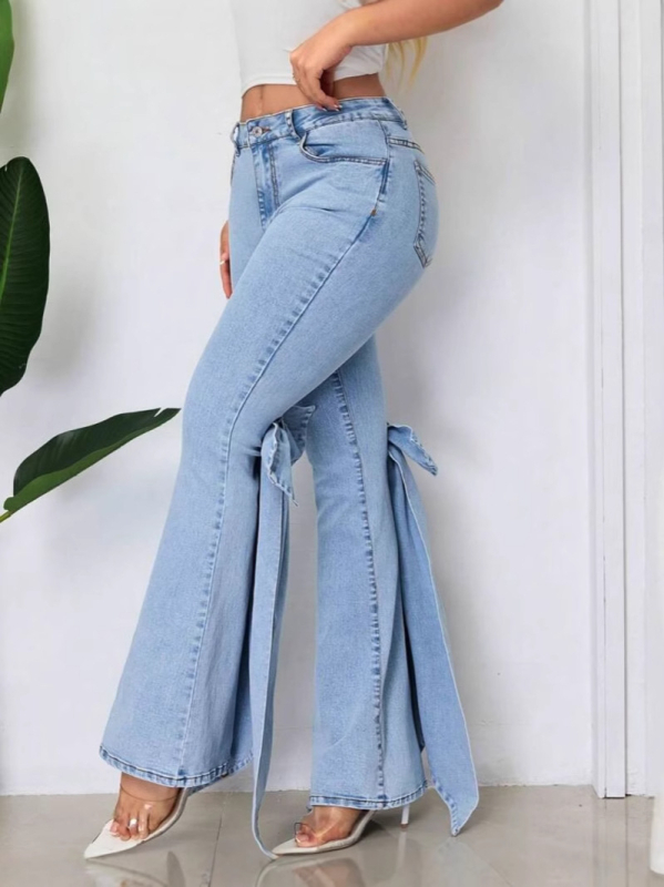 Traperice visokog struka, elastične, ukrasna mašna, blago šireće nogavice, kololáž/patchwork šivanje, 70–80% pamuk, elastan <30%