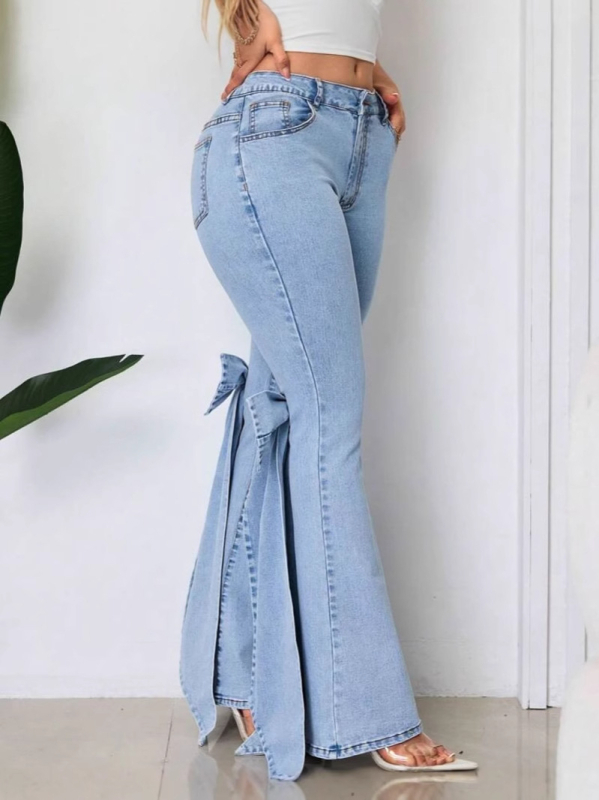Traperice visokog struka, elastične, ukrasna mašna, blago šireće nogavice, kololáž/patchwork šivanje, 70–80% pamuk, elastan <30%
