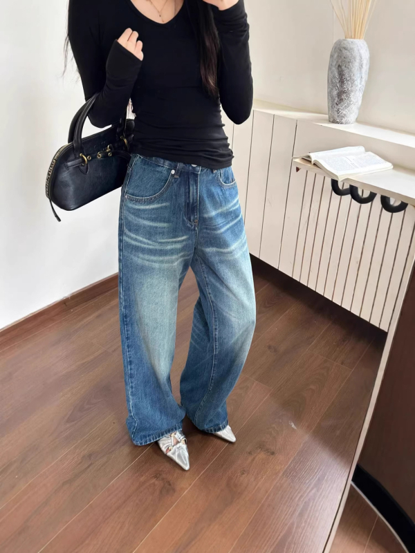 Traperice s vintage pranjem i fade efektom cat whisker, ravni kroj, opuštena udobna
