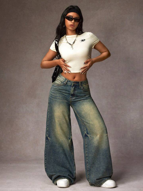 Jeansi cu talie înaltă și croială wide din denim, 50–70% bumbac și 30–50% poliester, finisaj spălat