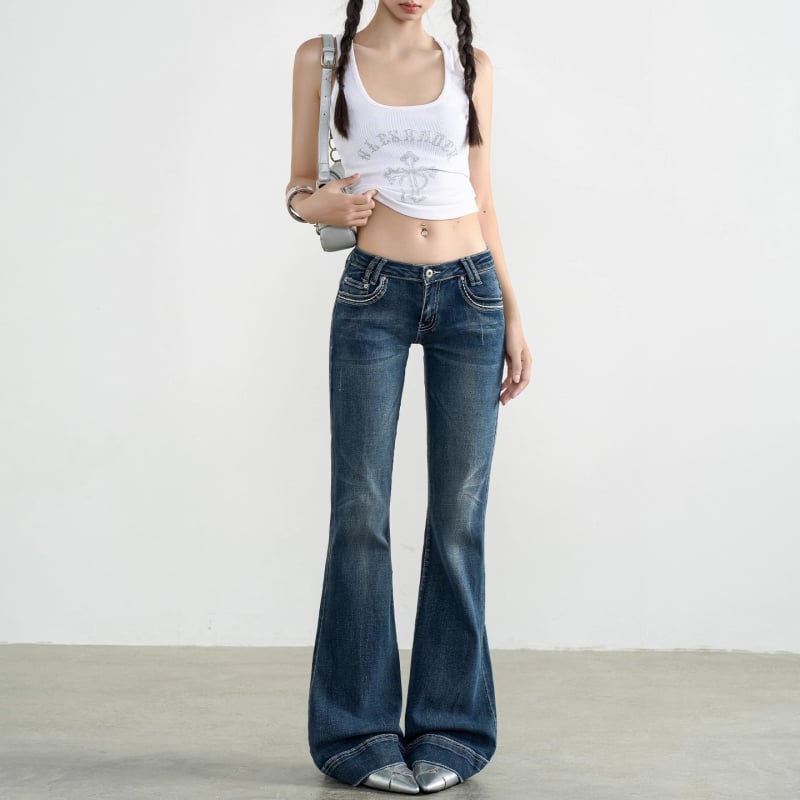 Traperice s flared krojem, niski struk, duljina do poda, denim